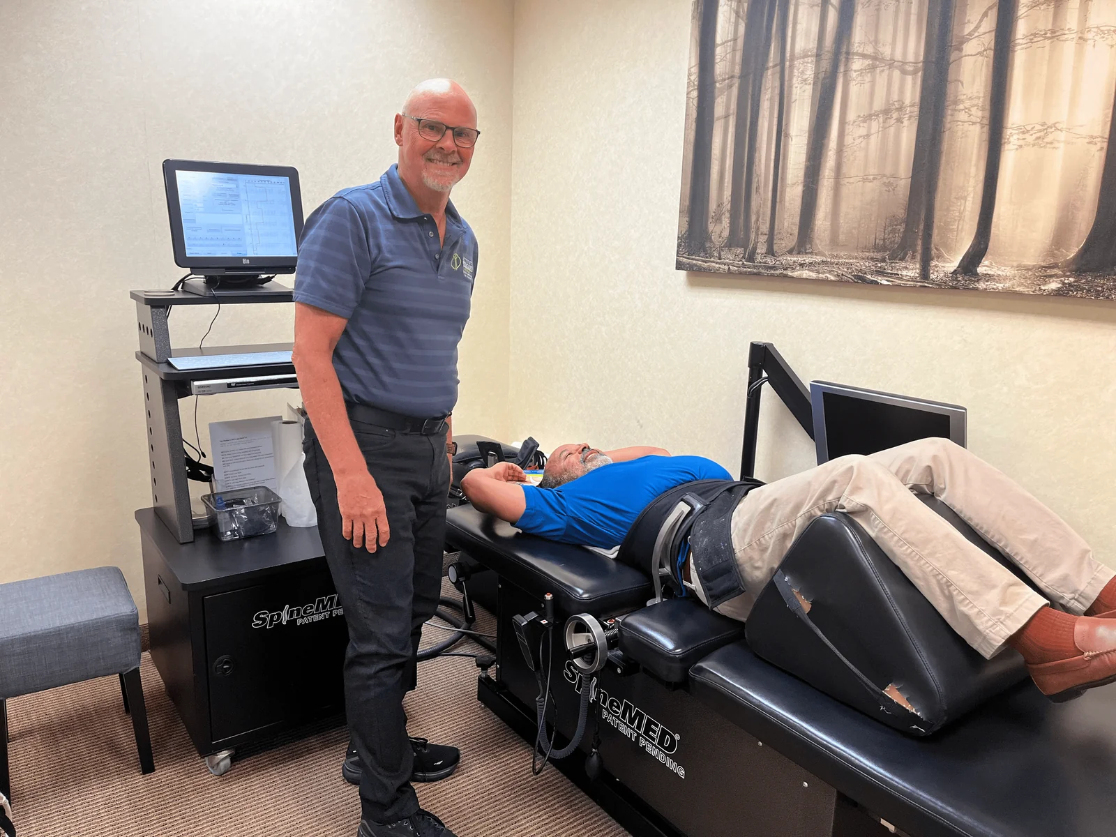 Active Lifestyle Medical treatment room with the decompression table and monitor cart in use